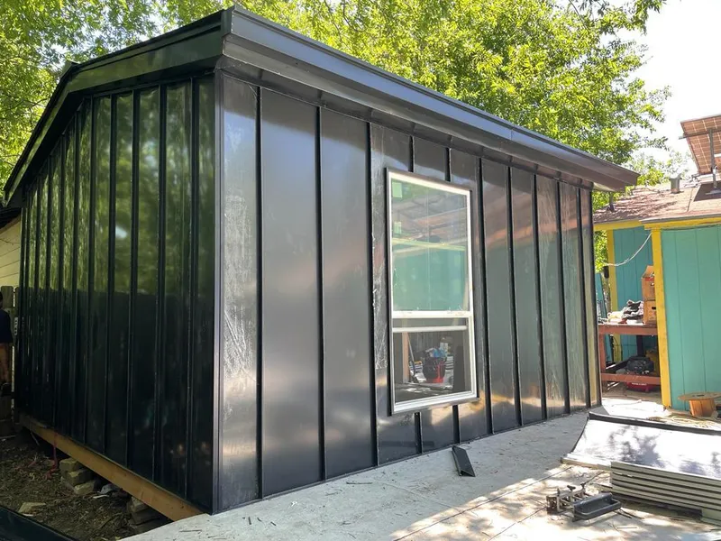 Black standing seam metal wall panels for Metal Roof Installation in Riverdale