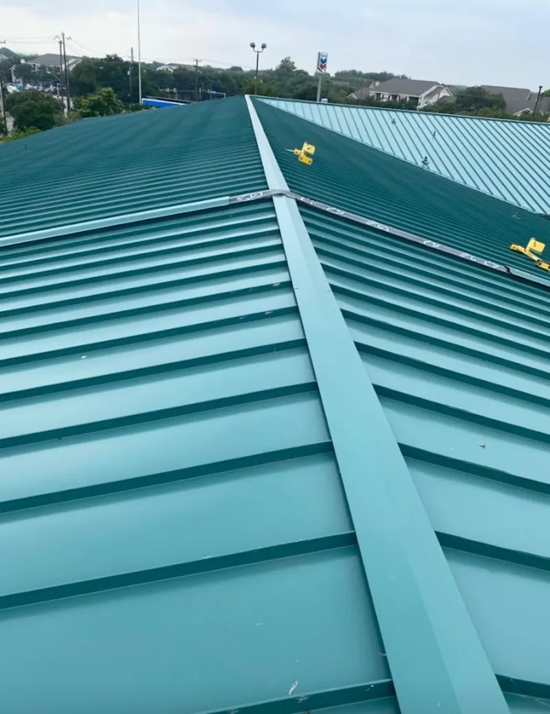 Green commercial metal roof ridge and valley for Metal Roof Repair in Riverdale
