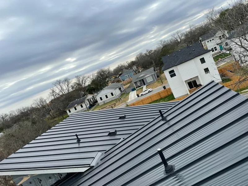 Standing seam metal roof panels with vents for Skylight Repair in Riverdale